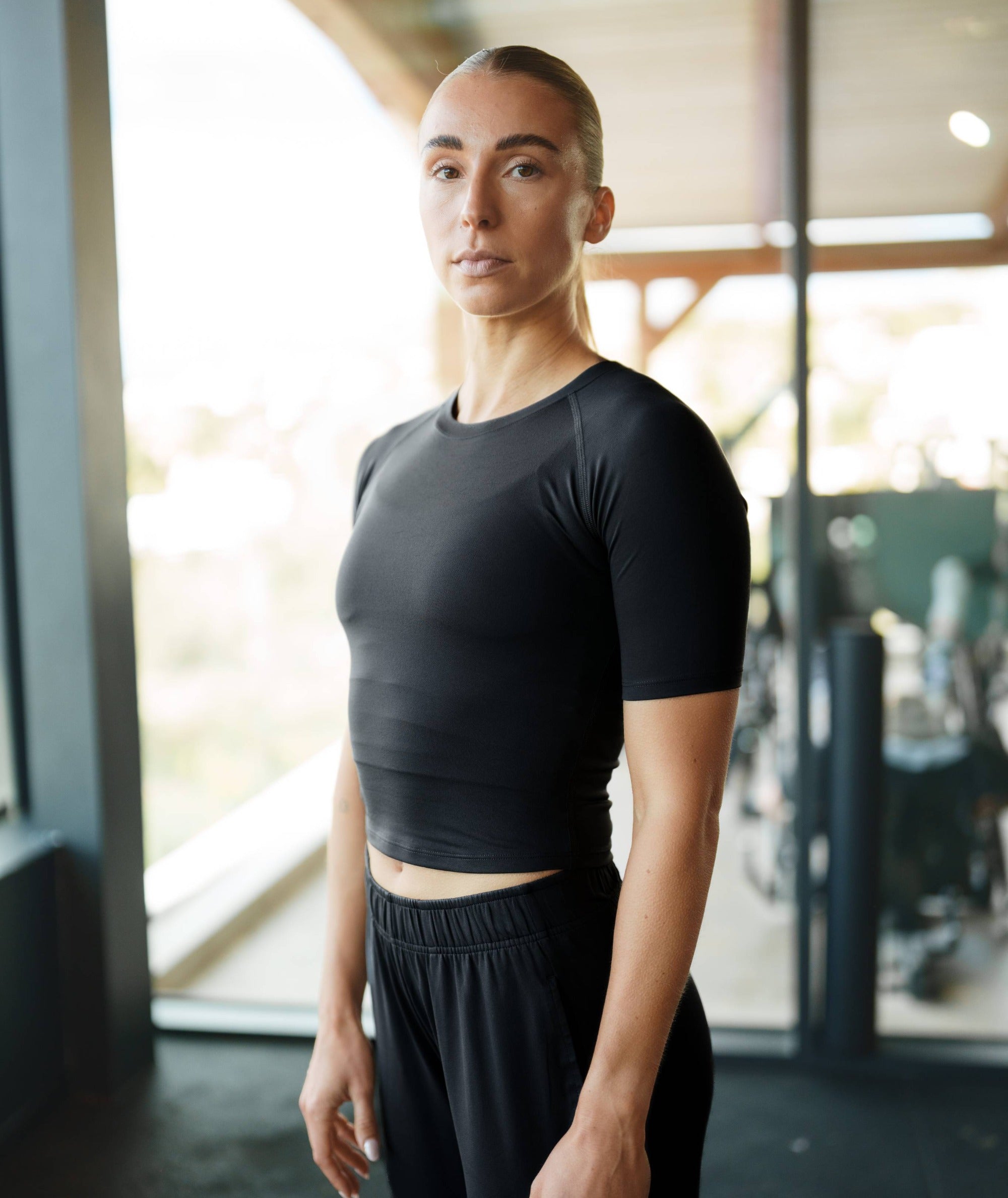 Gymnation Cropped ComfyKnit Tee #color_black