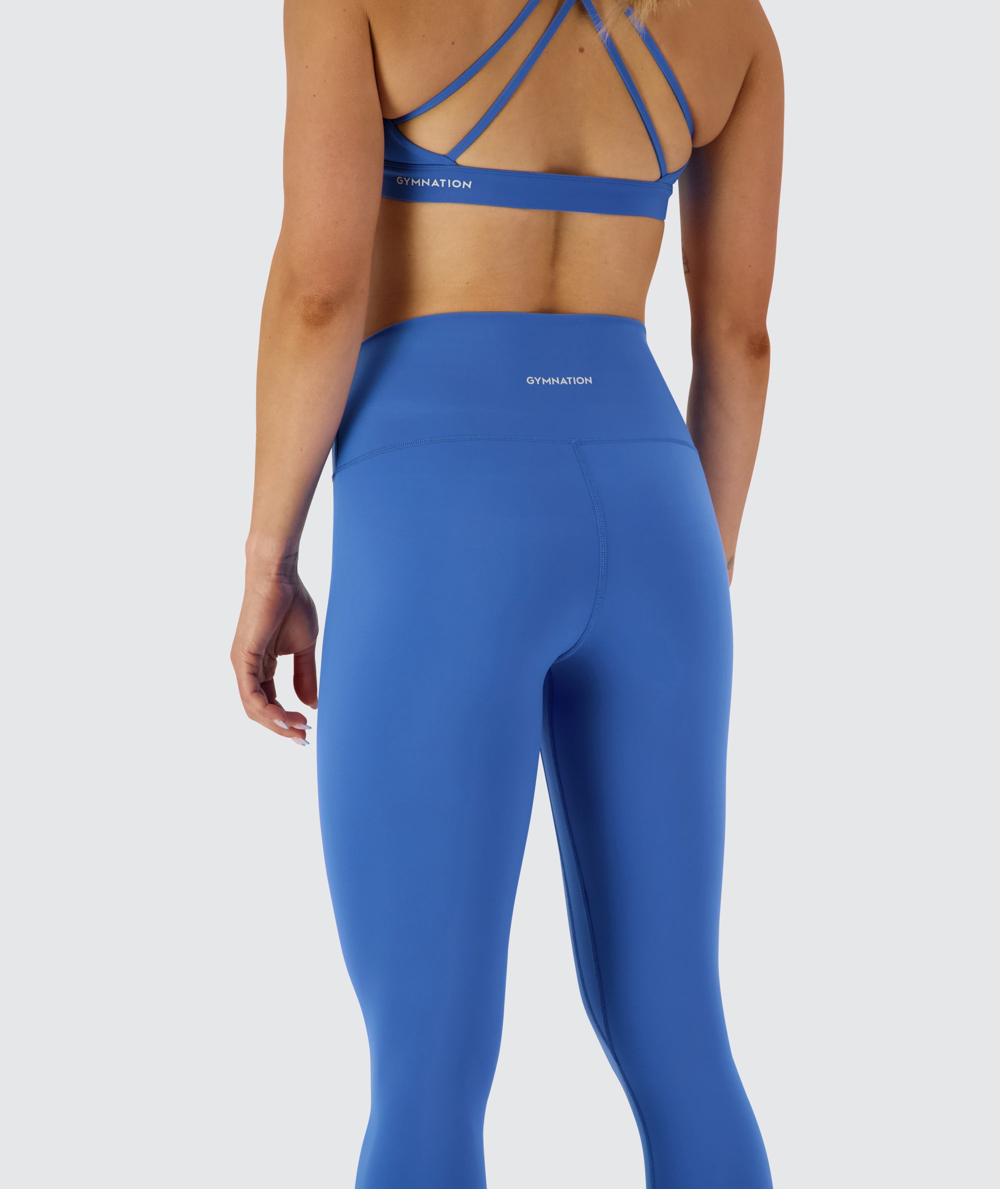High-Waisted training tights #color_blue-blaze