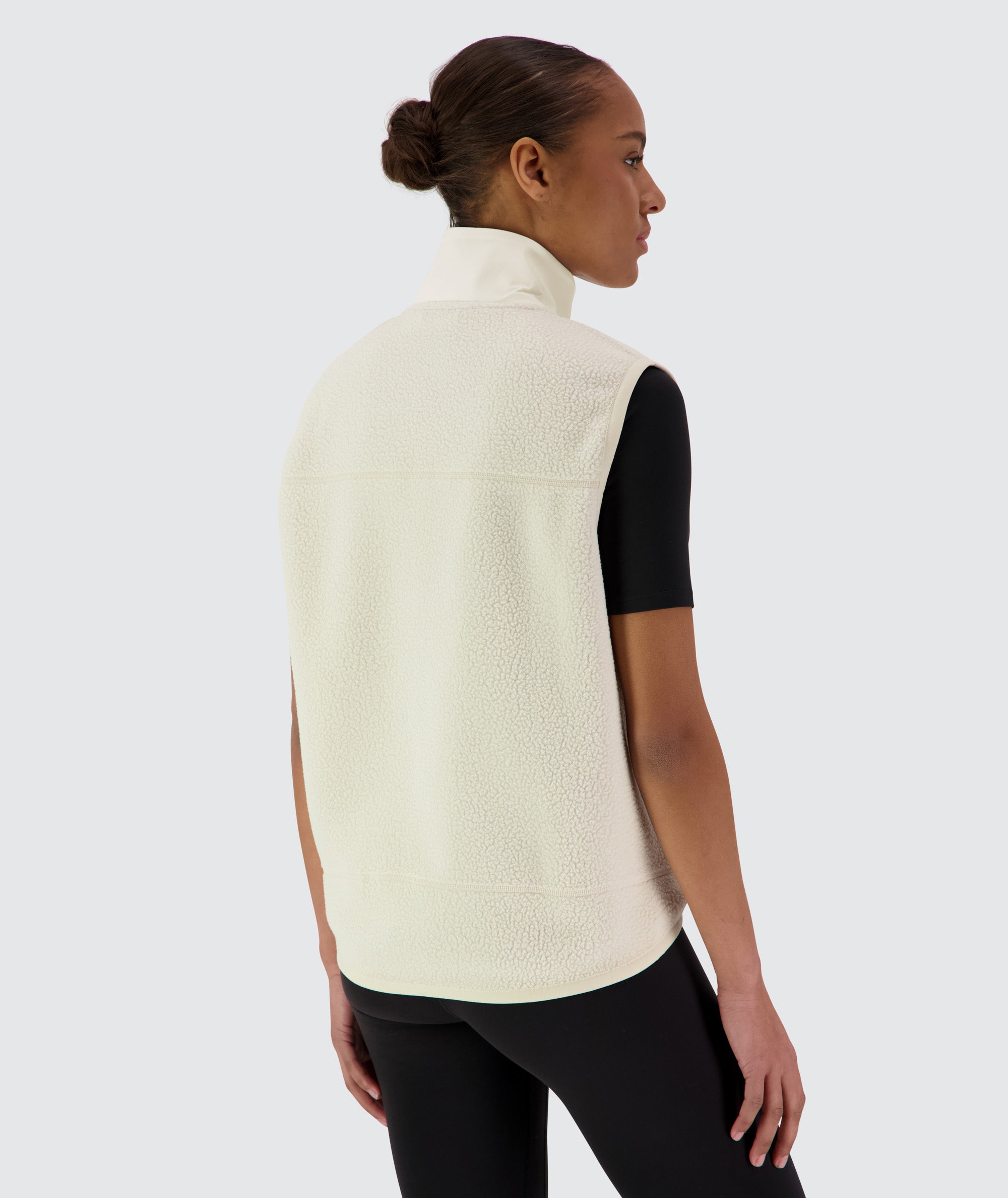 Gymnation Pile Vest Unisex #color_off-white