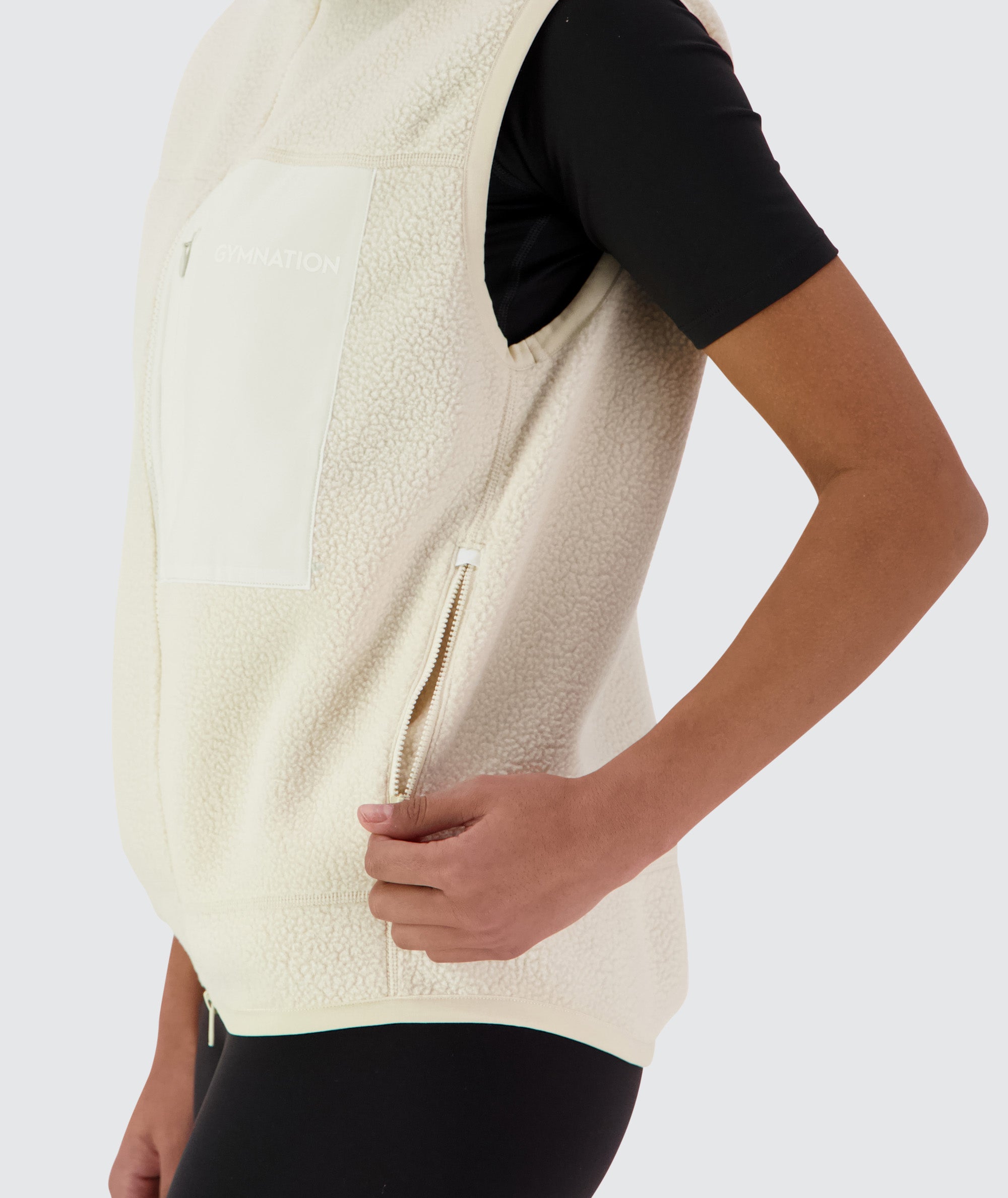 Gymnation Pile Vest Unisex #color_off-white