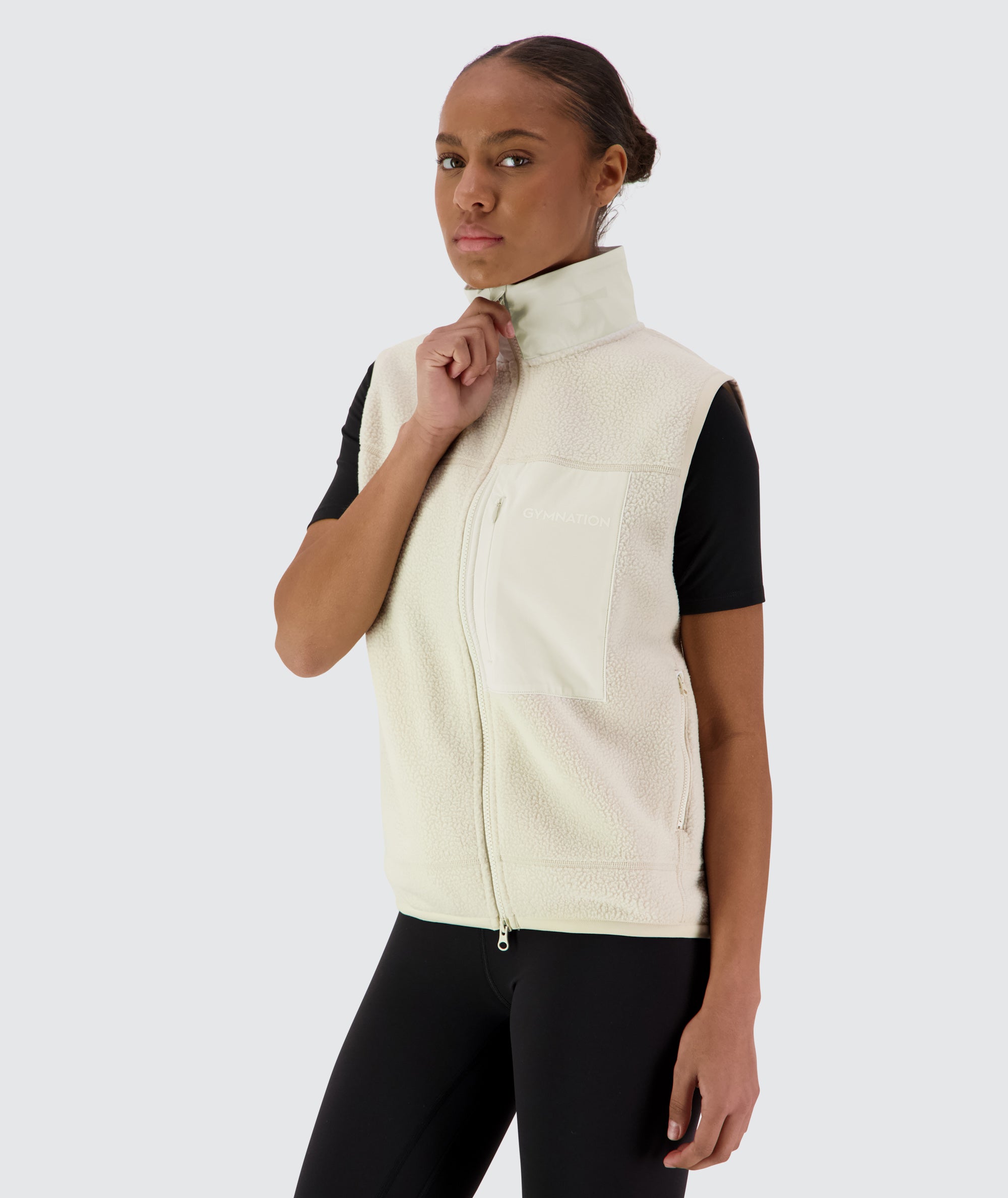 Gymnation Pile Vest Unisex #color_off-white