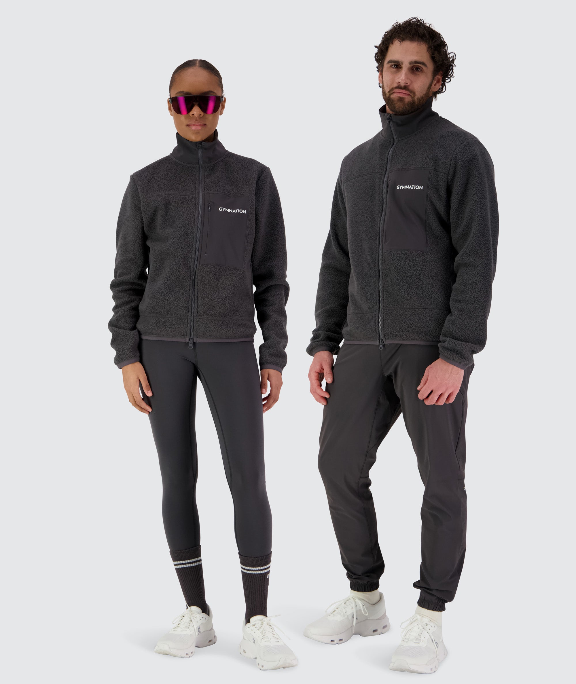 Gymnation Pile Jacket Unisex, Model Male 179cm size M / Female 167 size XXS #color_gravel-grey