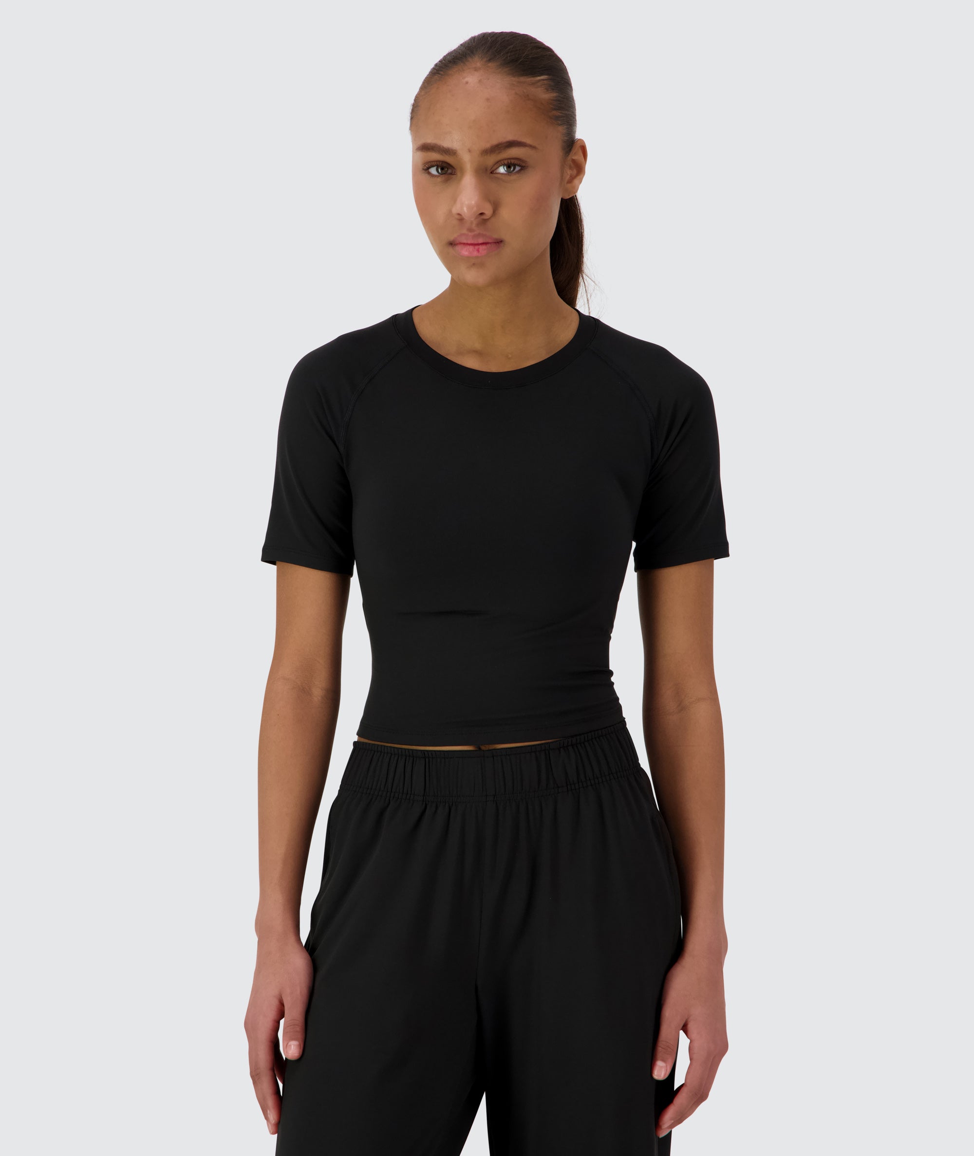 Gymnation Cropped ComfyKnit Tee Model 167 cm / size S #color_black