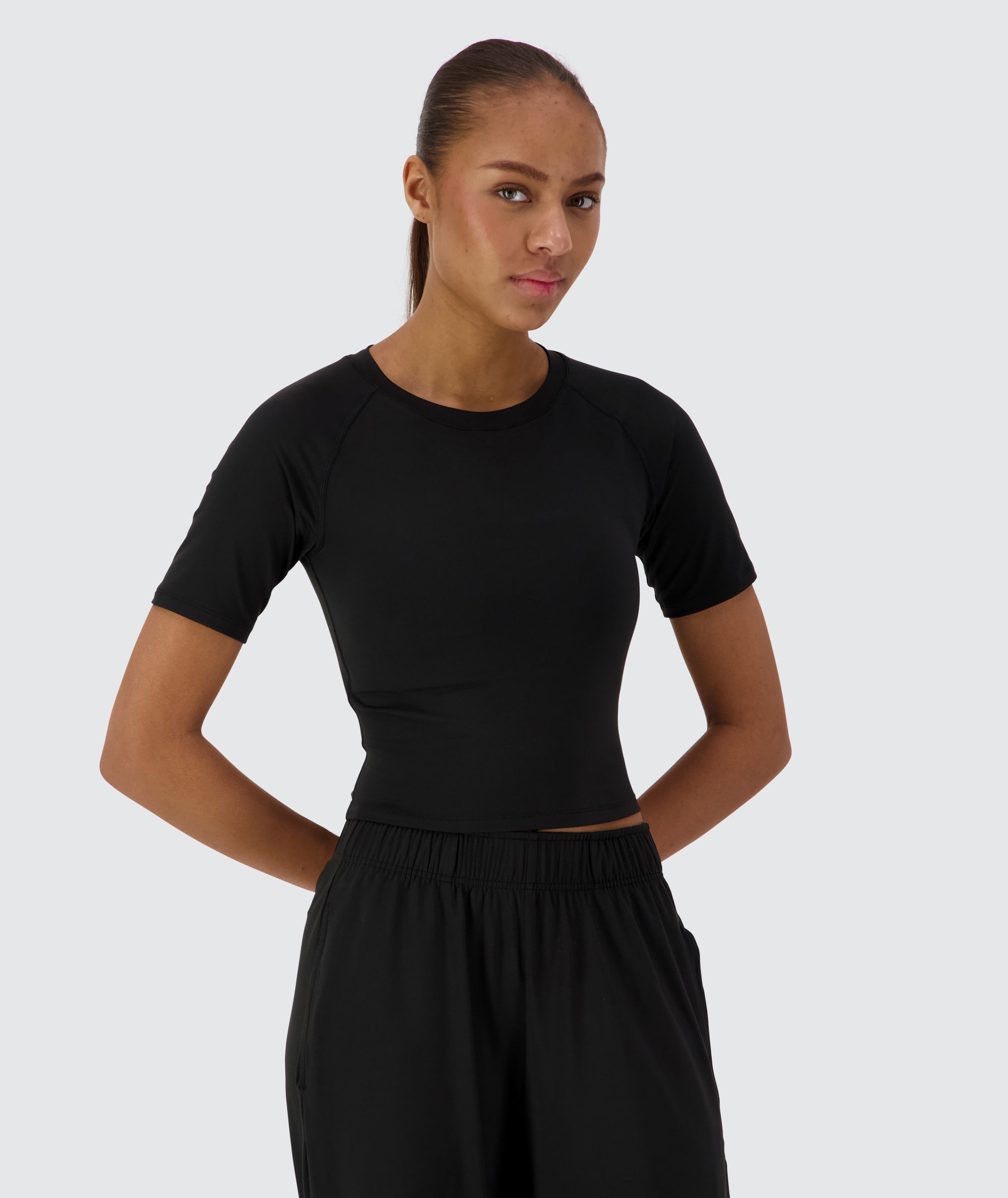 Gymnation Cropped ComfyKnit Tee #color_black