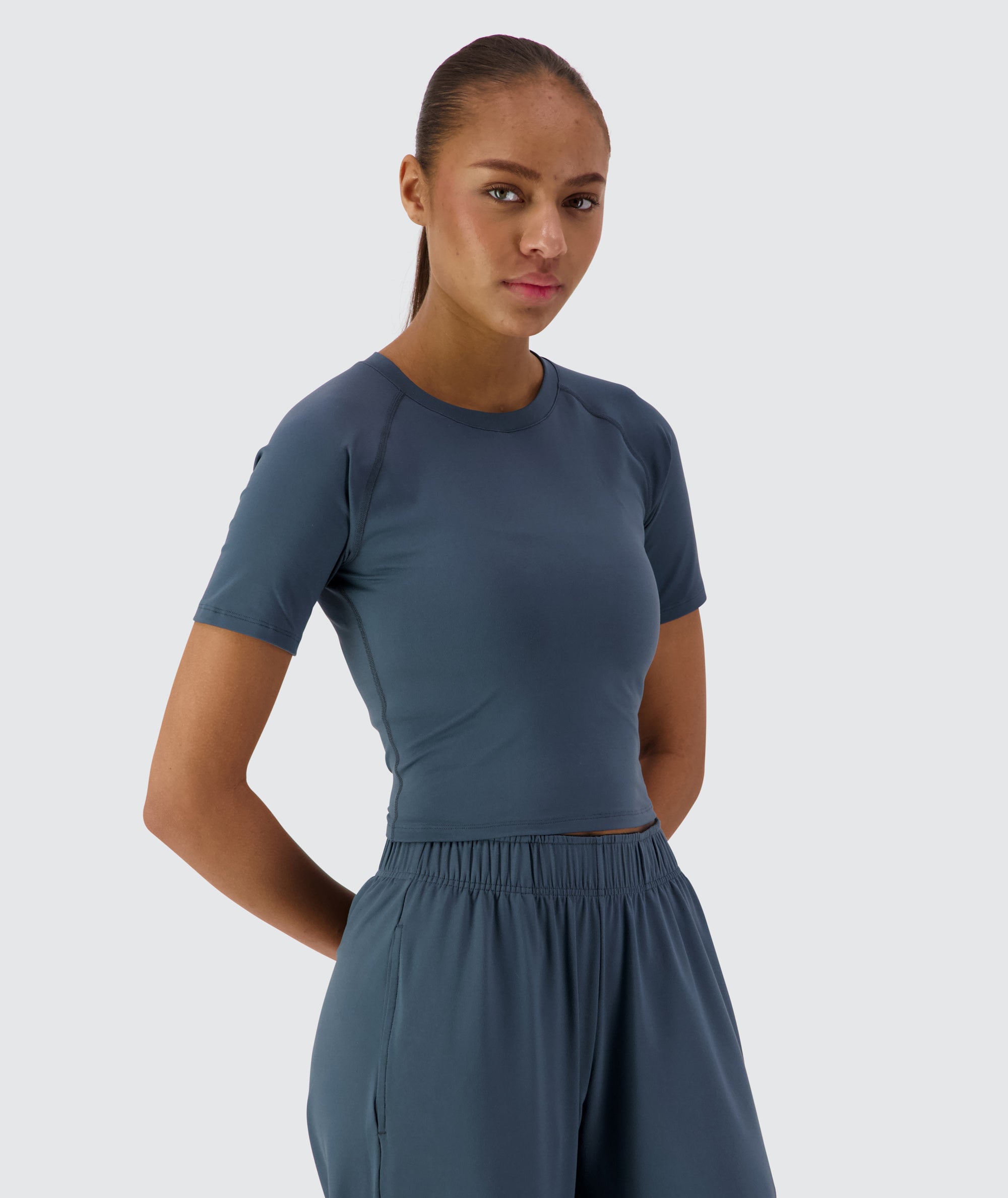 Gymnation Cropped ComfyKnit Tee #color_dusty-navy