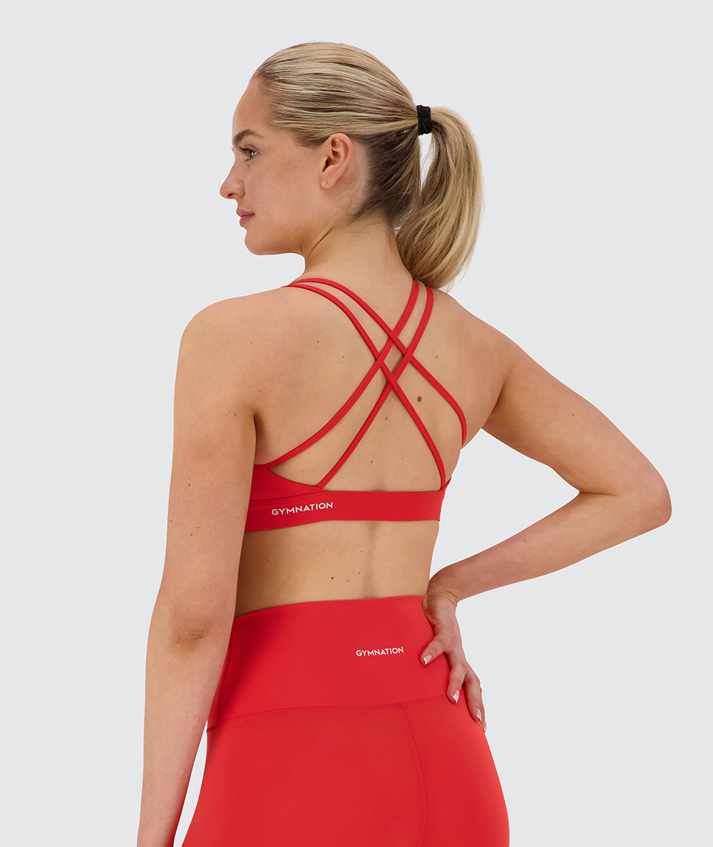 Strappy Sports Bra, Model 173 cm / size S#color_candy-red