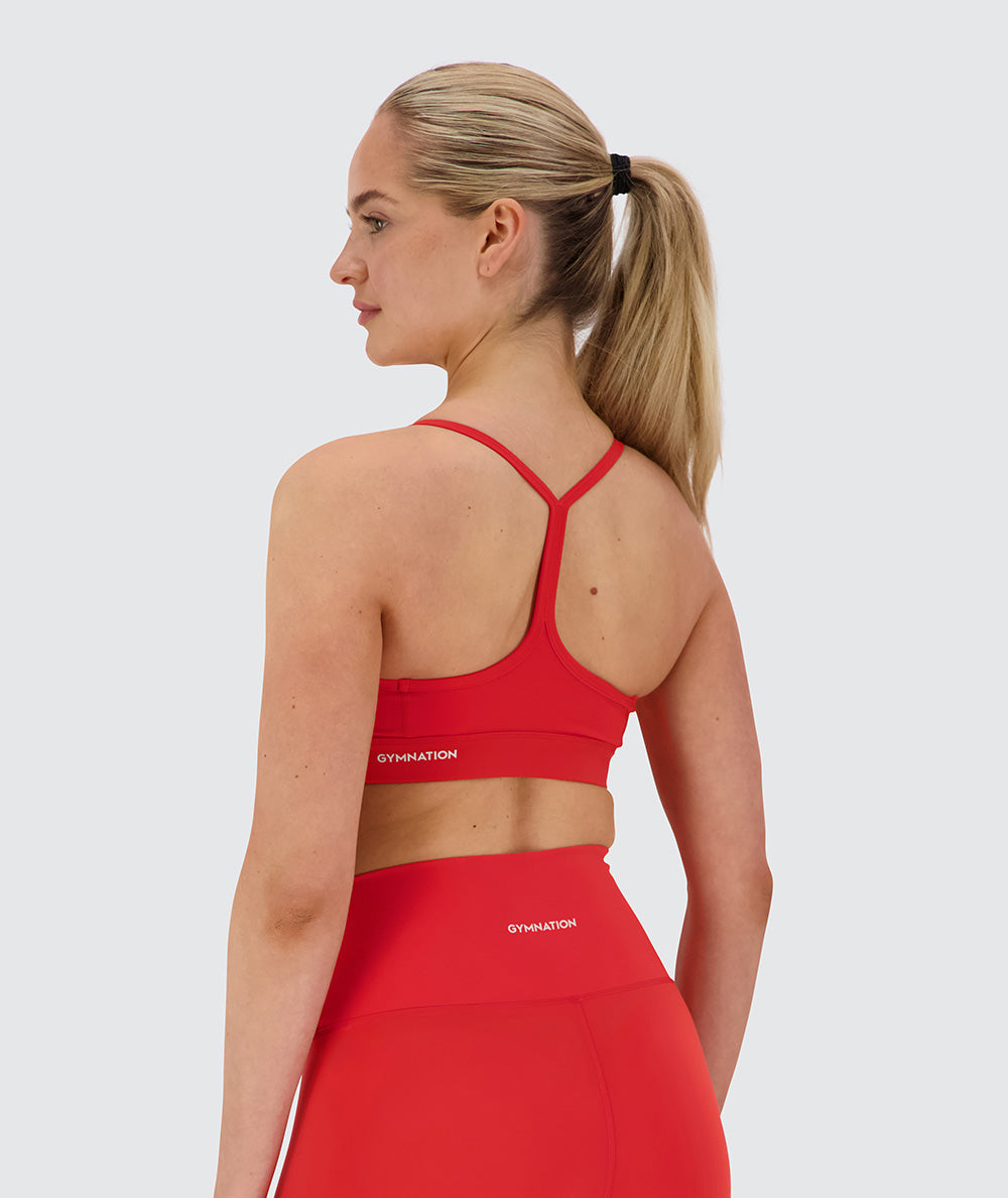 Training sports bra, Model 173 cm / size S#color_candy-red